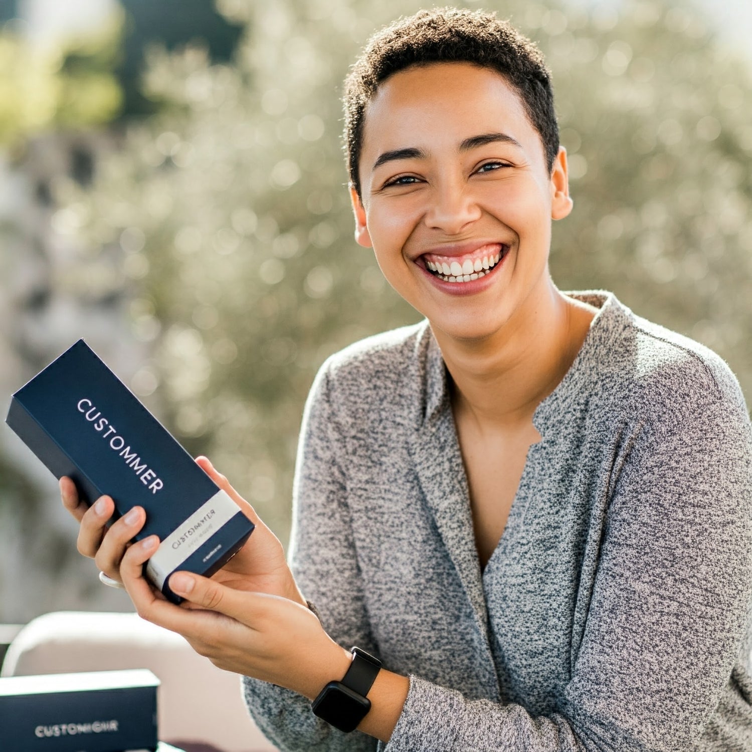 lady smiling over product she just received 